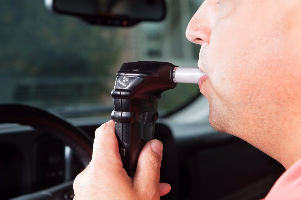 Alcohol interlock device in vehicle representing licence restrictions