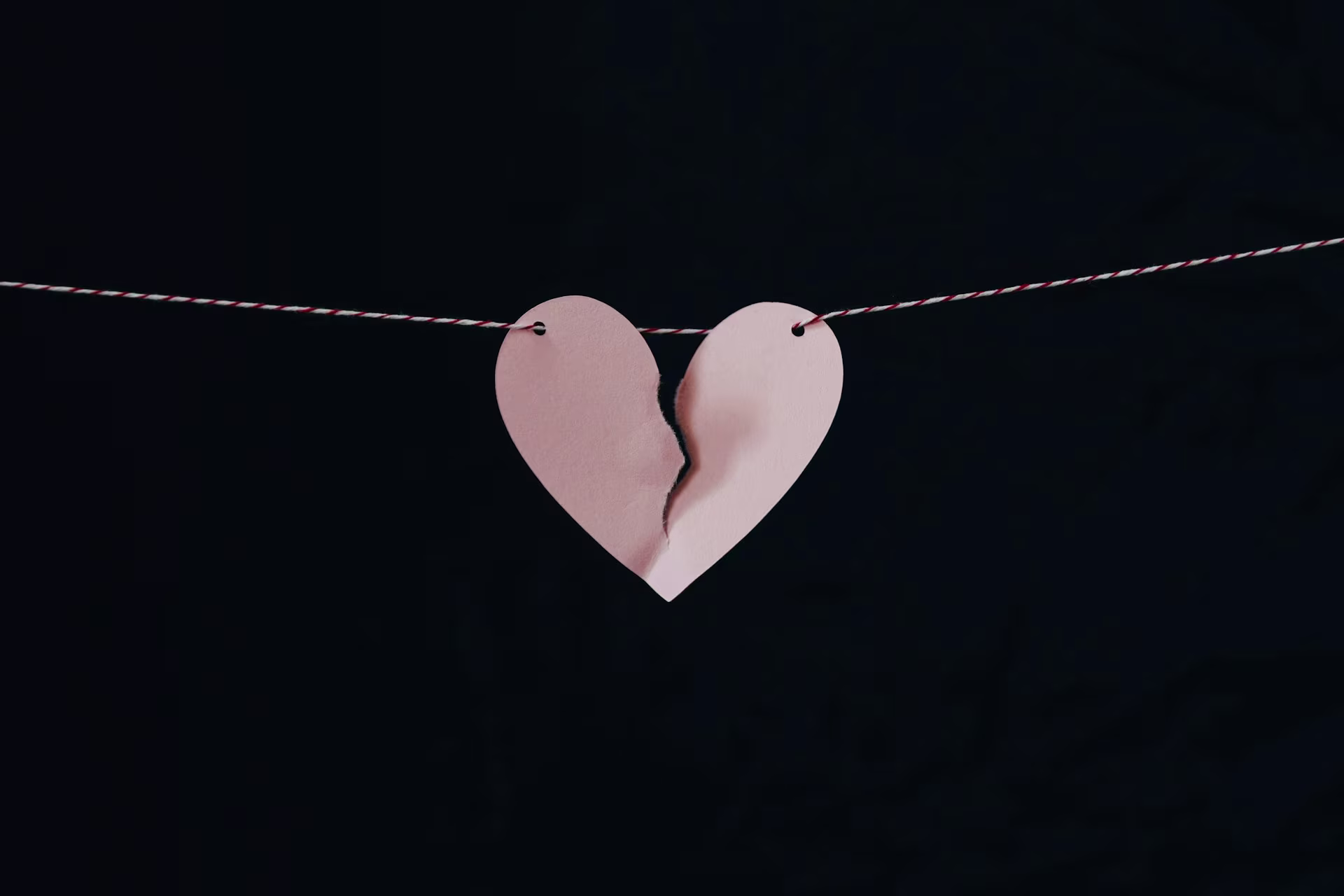 A broken heart on a piece of string