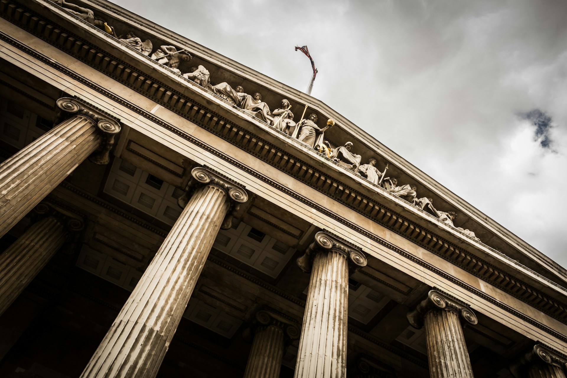 An old courthouse with columns symbolising justce system