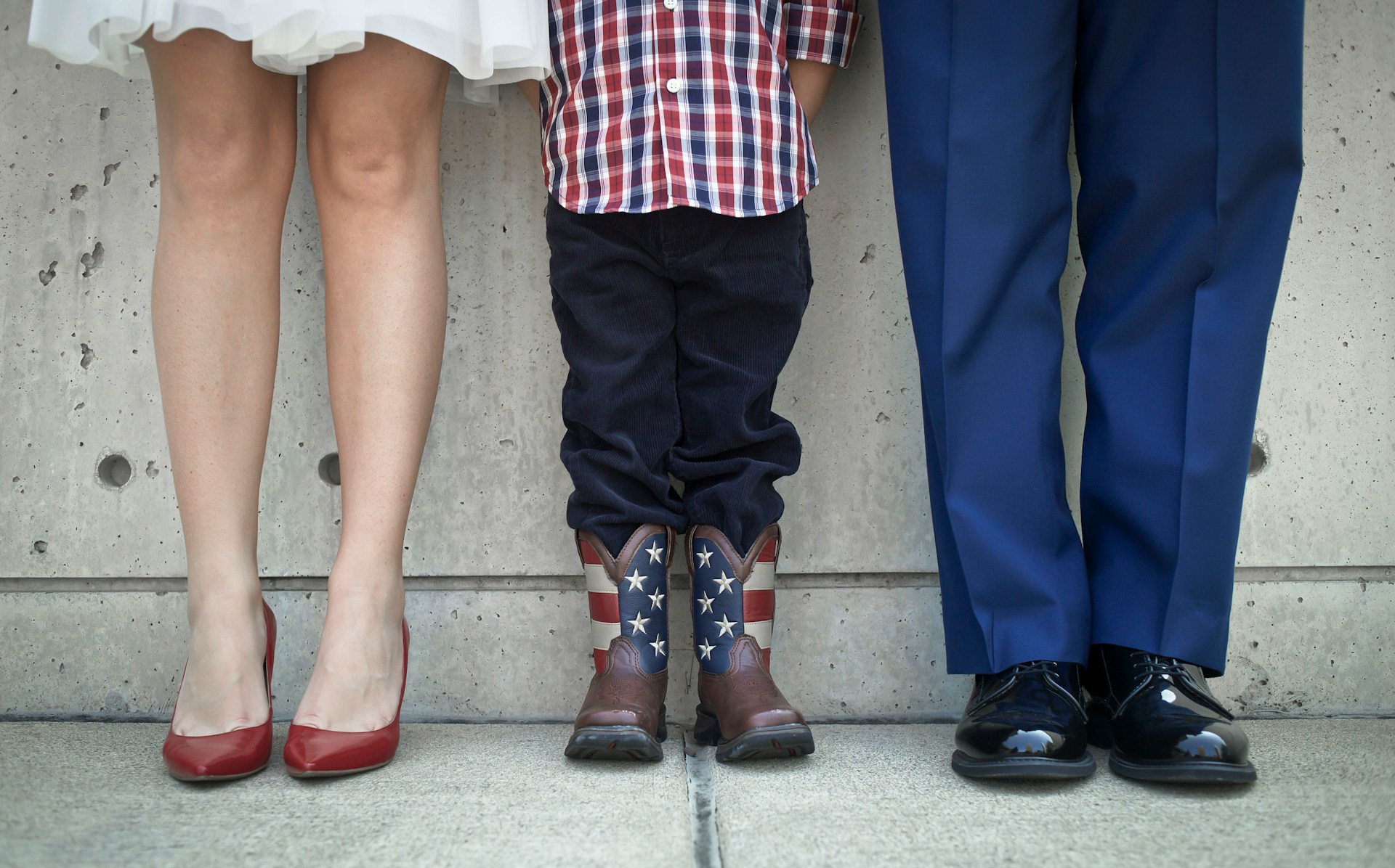 Two parents with a child, illustrating co-parenting after separation